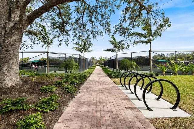 a living room with furniture or kitchen view and a wooden floor