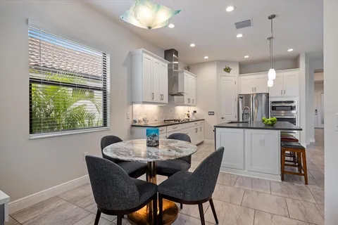 a view of a dining room with furniture