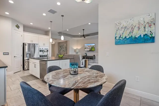 a view of workspace with furniture and window