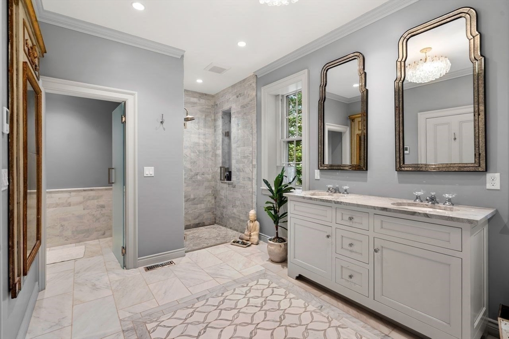 38 Chestnut Street Salem, MA 01970 - Photo 21 of 41 a spacious bathroom with a shower sink and mirror