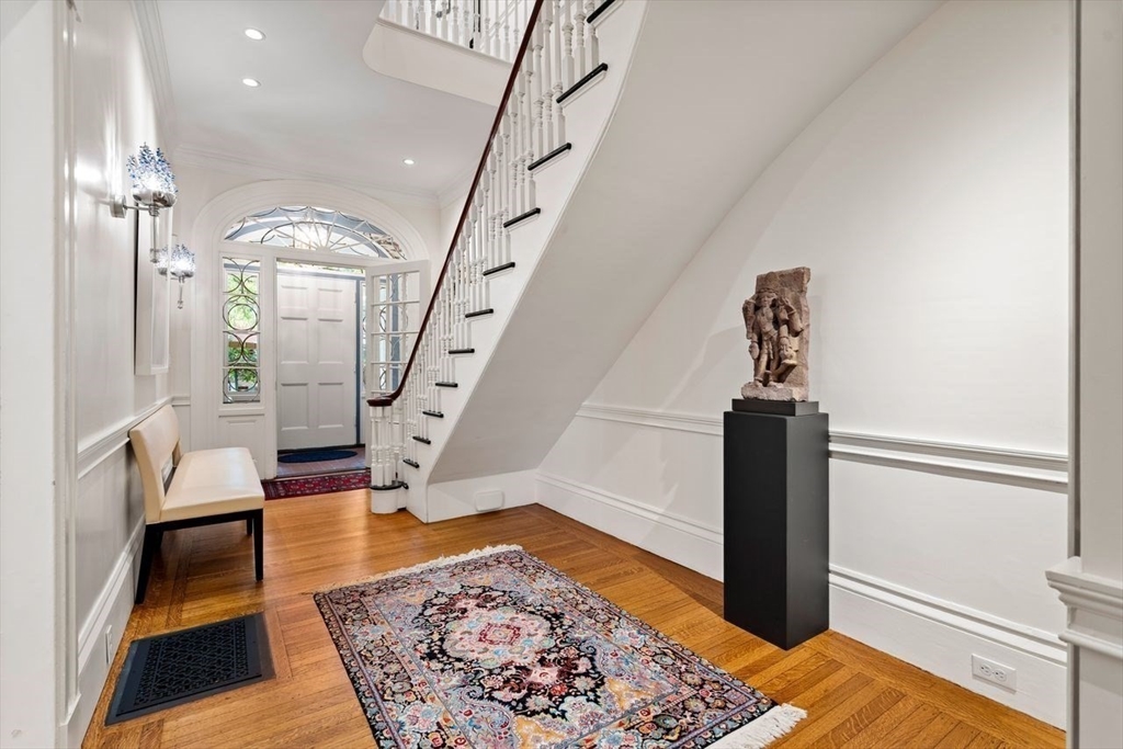 38 Chestnut Street Salem, MA 01970 - Photo 6 of 41 a view of entryway and hall with wooden floor