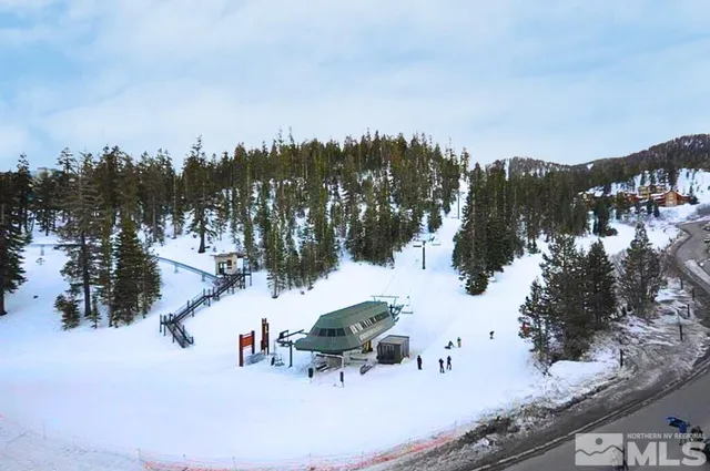 a white bench sitting in the middle of a city
