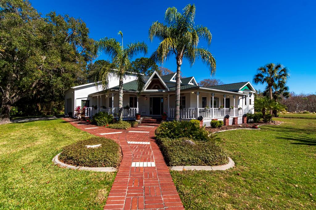 9215 Ridge Road New Port Richey, FL 34654 - Photo 1 of 71