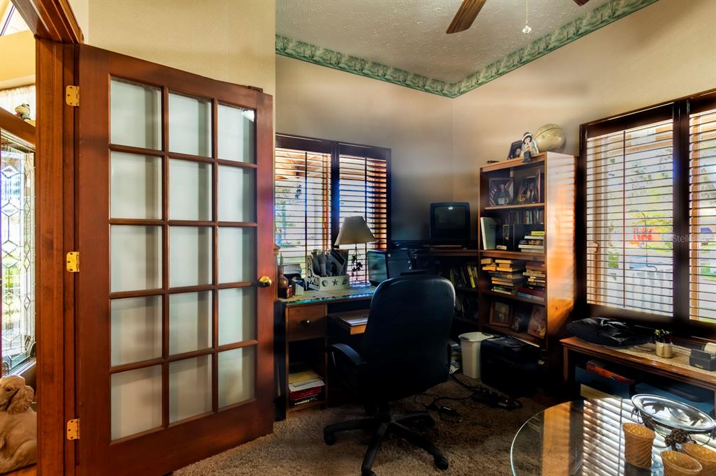 9215 Ridge Road New Port Richey, FL 34654 - Photo 19 of 71 a room with furniture and a window