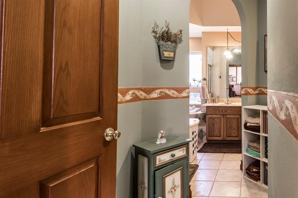 9215 Ridge Road New Port Richey, FL 34654 - Photo 40 of 71 a room with cabinets and appliances