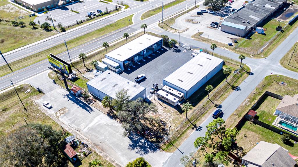 9215 Ridge Road New Port Richey, FL 34654 - Photo 61 of 71 an aerial view of a house with a garden