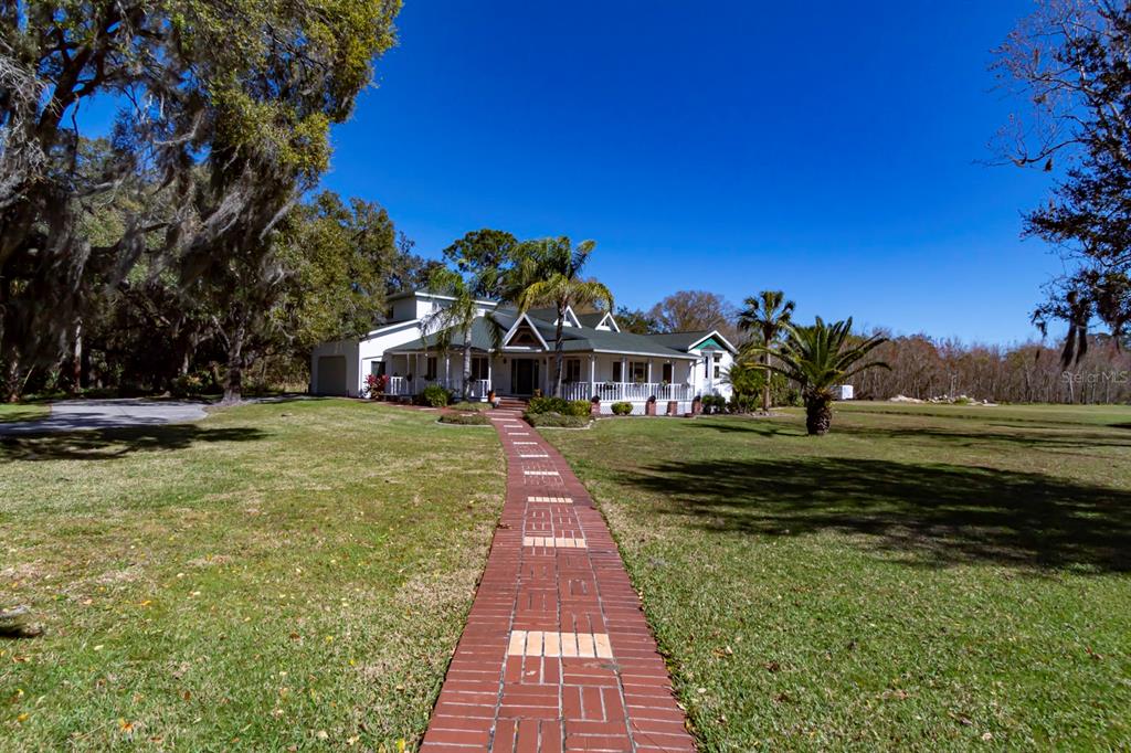 9215 Ridge Road New Port Richey, FL 34654 - Photo 10 of 71 a view of a park with large trees