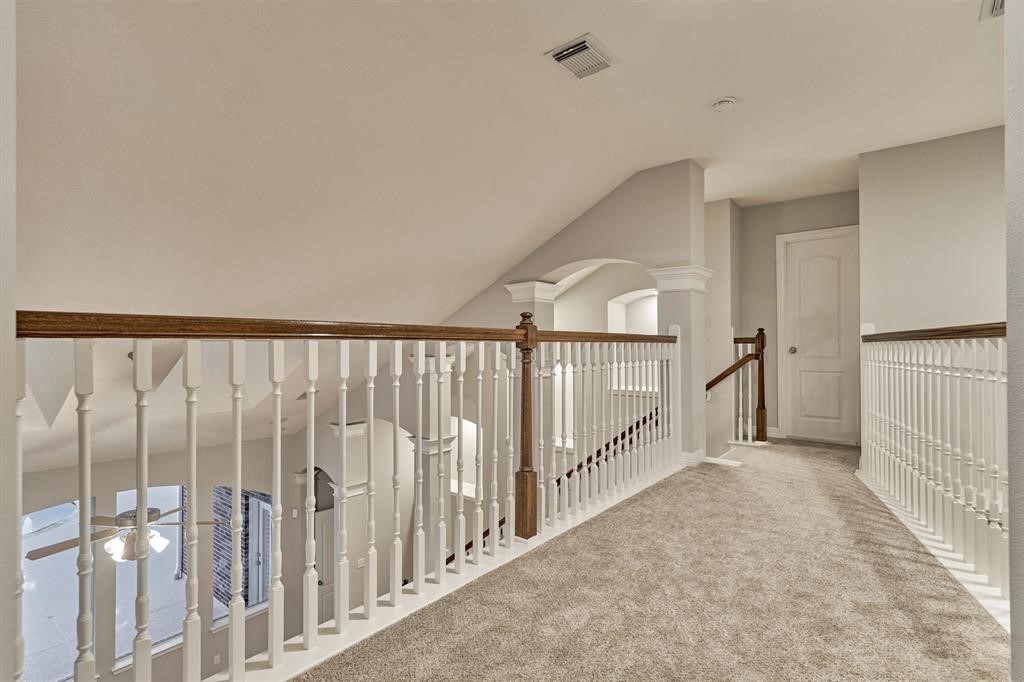 20806 East Cameron Ridge Drive Cypress, TX 77433 - Photo 29 of 45 a view of a hallway with wooden floor