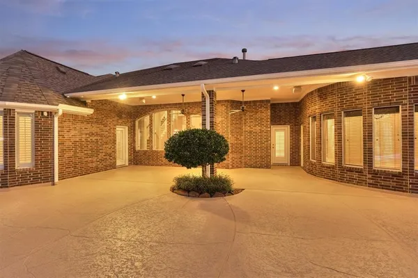 a view of a house with a street