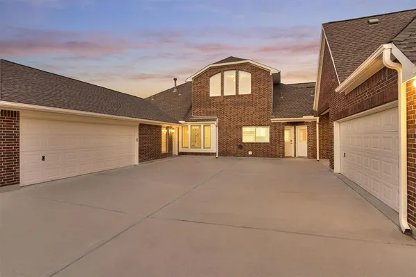 a front view of a house with yard
