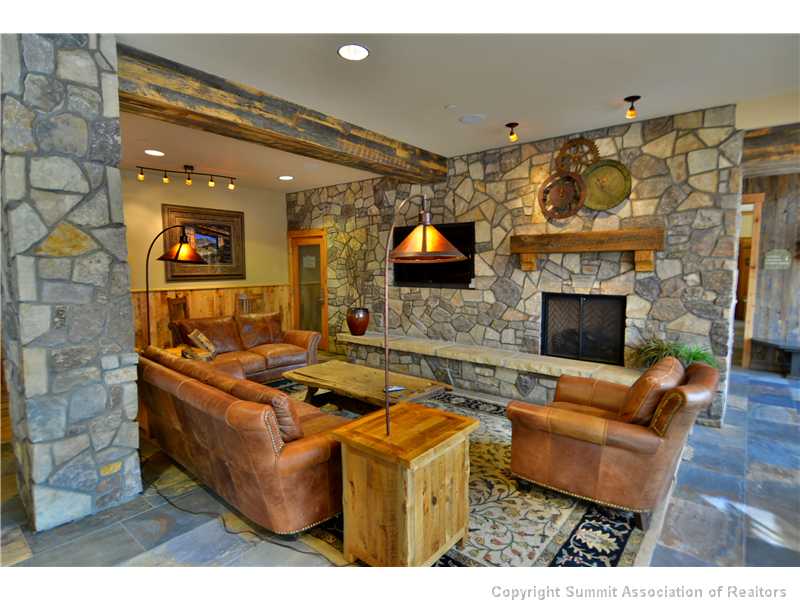 195 River Run Road, Unit 8043 Keystone, CO 80435 - Photo 16 of 25 Recreation Room. Rec room offers lounge with a fireplace.