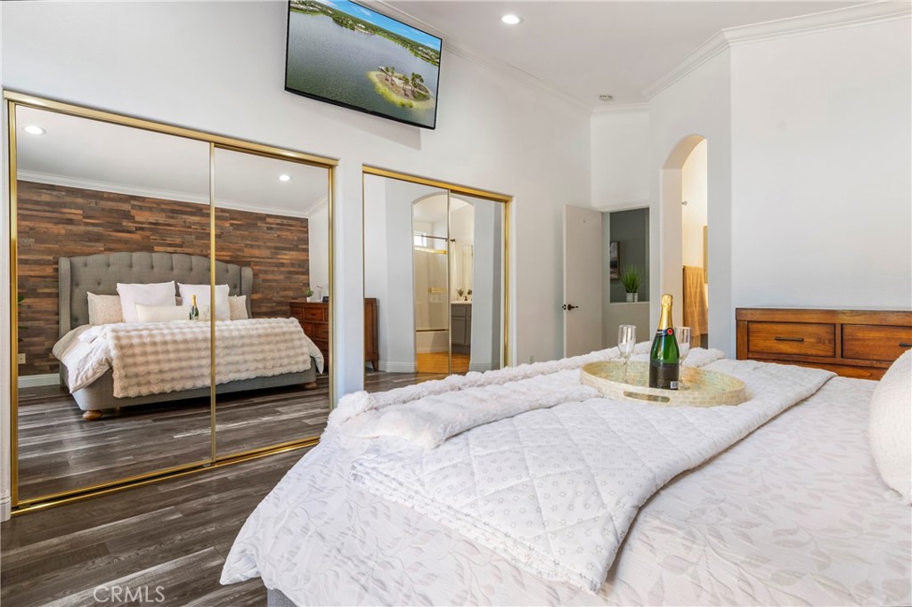 16366 West Sun Canyon Street Riverside, CA 92503 - Photo 11 of 21 a bedroom with a bed and glass door