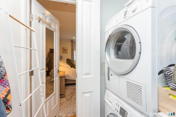a close view of a kitchen with a washer and dryer