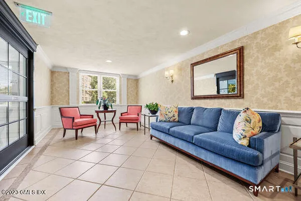 a living room with furniture and a window