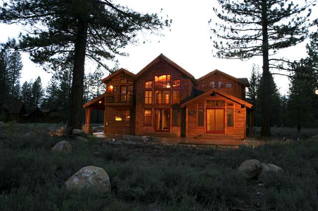 12561 Caleb Drive, Unit LOT #93 Truckee, CA 96161 - Photo 3 of 5 a front view of a house with a yard and garage