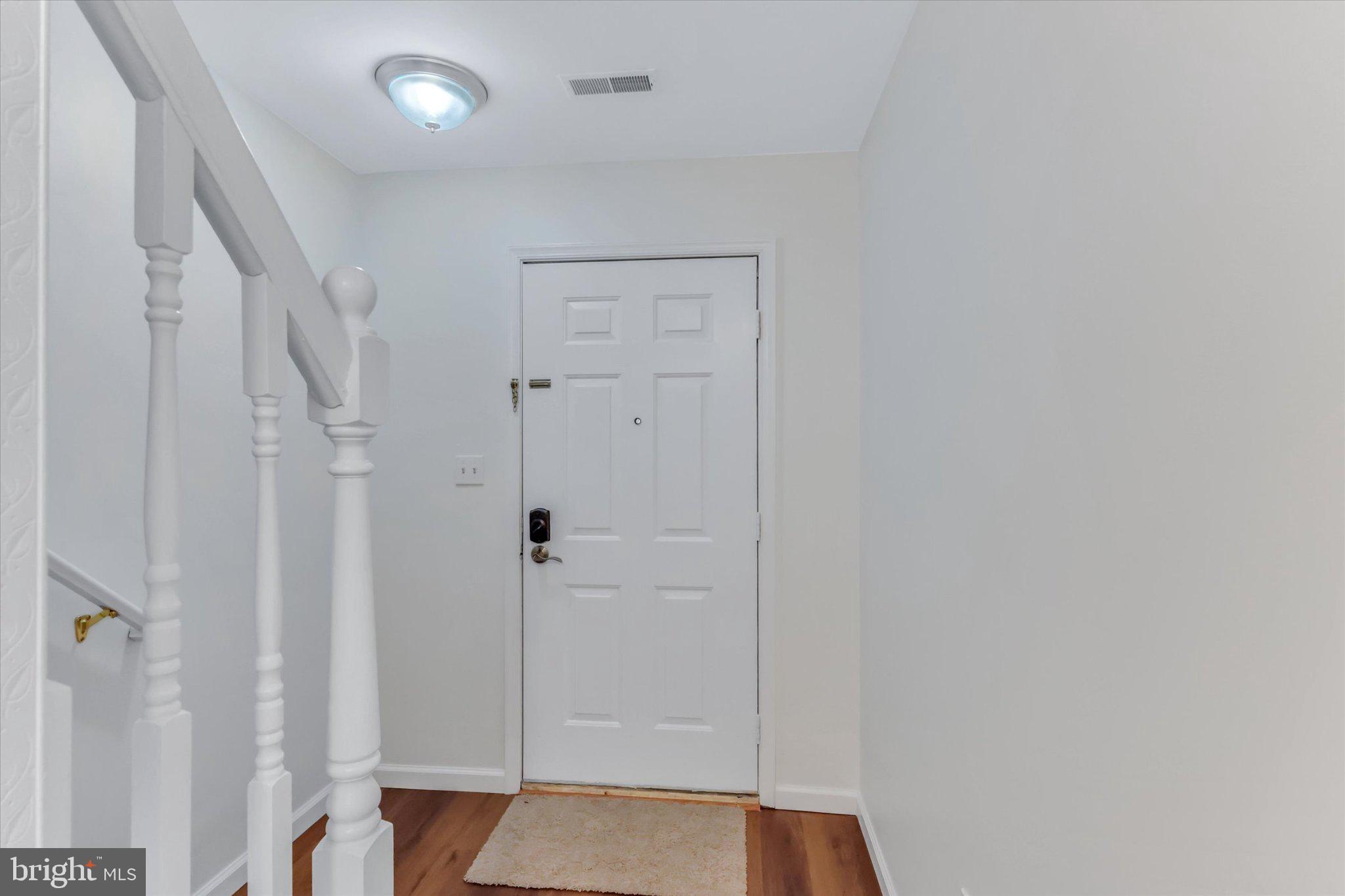 14323 Gate Dancer Lane Boyds, MD 20841 - Photo 20 of 54 Welcoming entryway with modern charm.