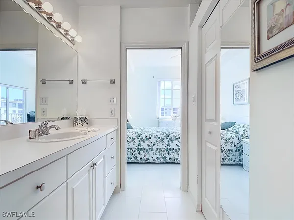 a bedroom with a bed and furniture