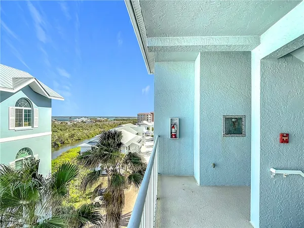 an aerial view of city and lake