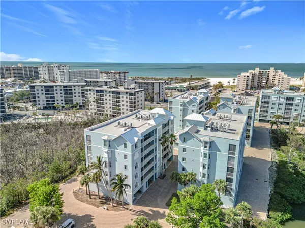 a view of a city with ocean view