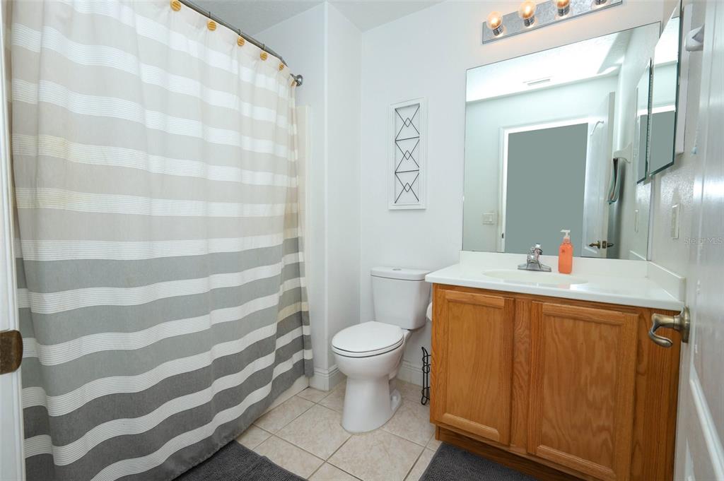 3222 Merrick Avenue Rockledge, FL 32955 - Photo 36 of 73 a bathroom with a sink toilet and shower