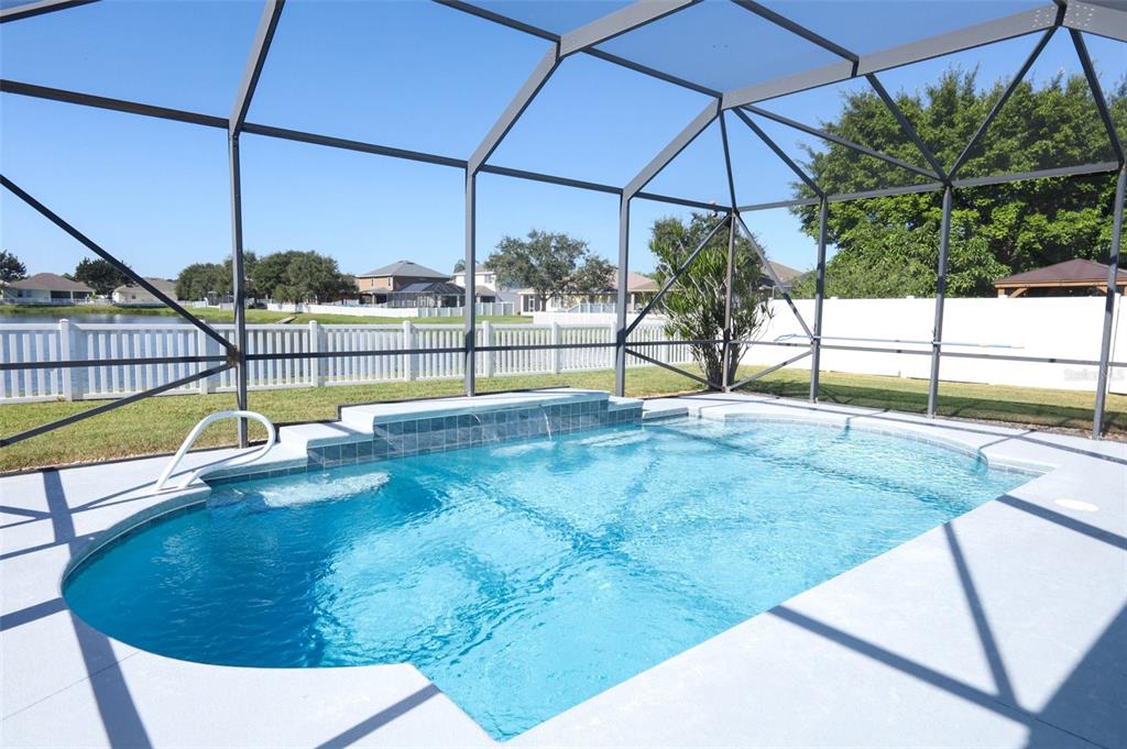 3222 Merrick Avenue Rockledge, FL 32955 - Photo 47 of 73 a view of a swimming pool with a lounge chairs