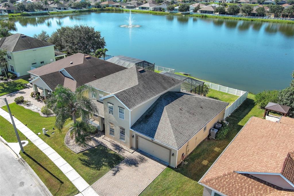 3222 Merrick Avenue Rockledge, FL 32955 - Photo 58 of 73 an aerial view of a house with a lake view