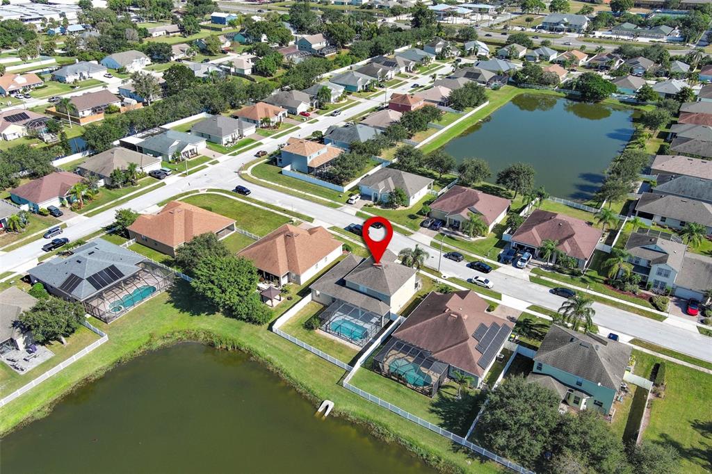 3222 Merrick Avenue Rockledge, FL 32955 - Photo 61 of 73 an aerial view of residential houses with outdoor space