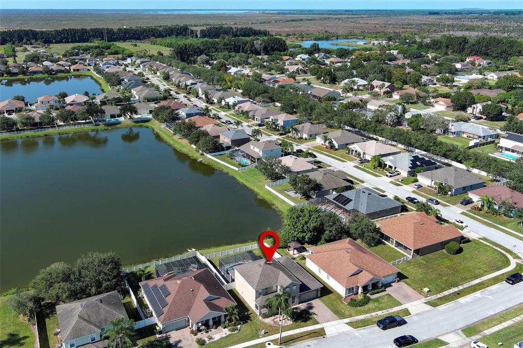 3222 Merrick Avenue Rockledge, FL 32955 - Photo 63 of 73 an aerial view of a city with lake view