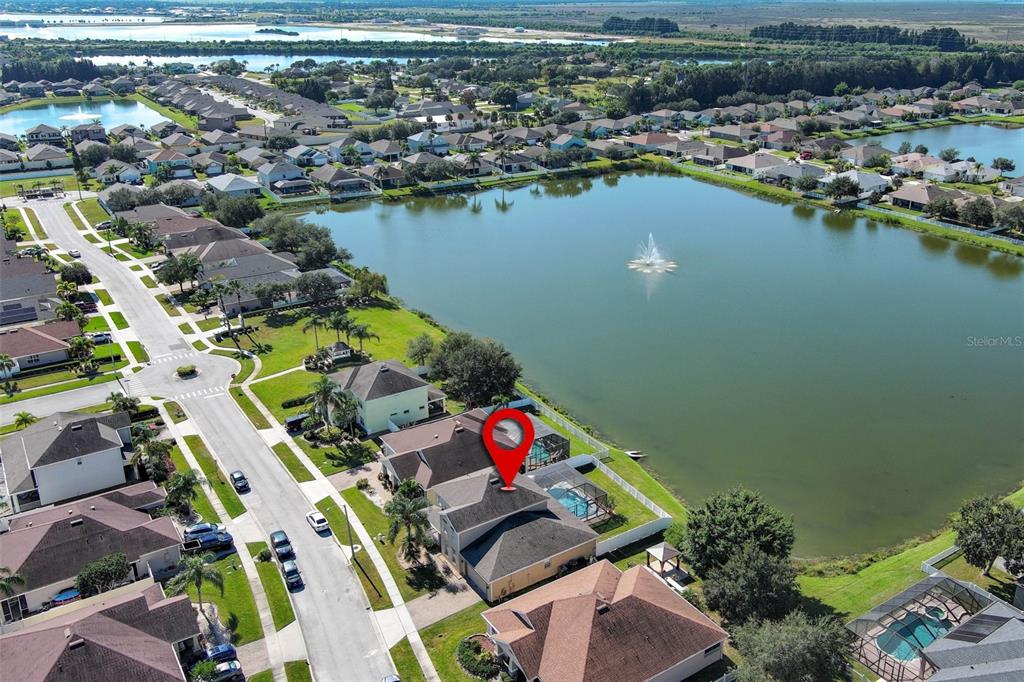 3222 Merrick Avenue Rockledge, FL 32955 - Photo 64 of 73 an aerial view of residential houses with outdoor space and lake view
