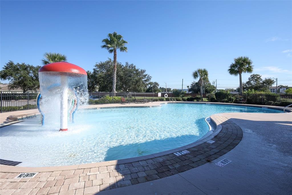 3222 Merrick Avenue Rockledge, FL 32955 - Photo 69 of 73 a view of a house with a yard and a fountain