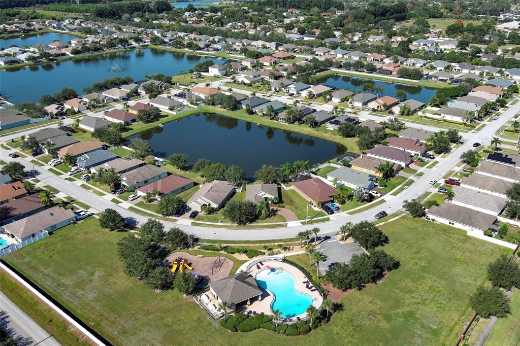 3222 Merrick Avenue Rockledge, FL 32955 - Photo 72 of 73 an aerial view of a house with a lake view