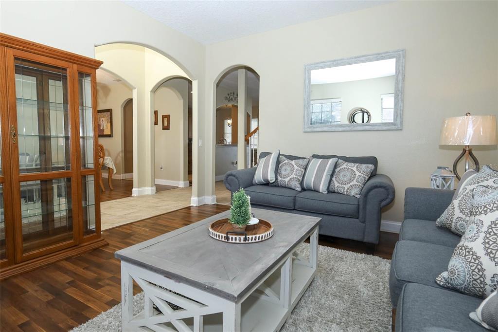 3222 Merrick Avenue Rockledge, FL 32955 - Photo 9 of 73 a living room with furniture and wooden floor