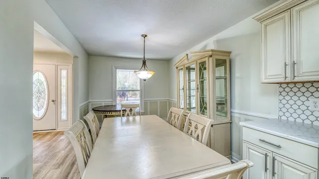 a view of a hallway with windows