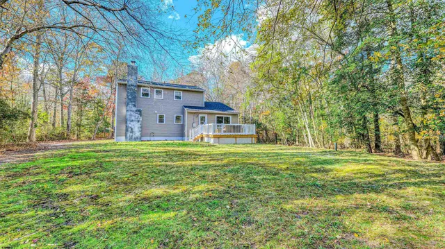 a view of a house with a big yard