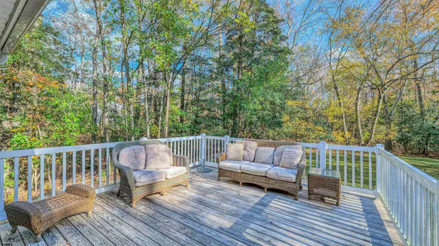 a view of roof deck with patio