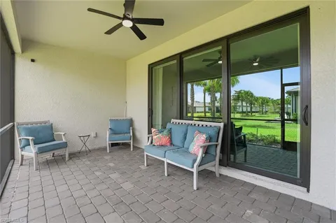 a view of a patio with a backyard