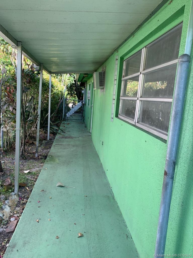 701 Tamiami Canal Road Miami, FL 33144 - Photo 7 of 13 a view of a porch