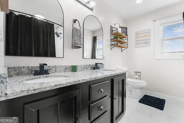 a workspace with furniture and a window