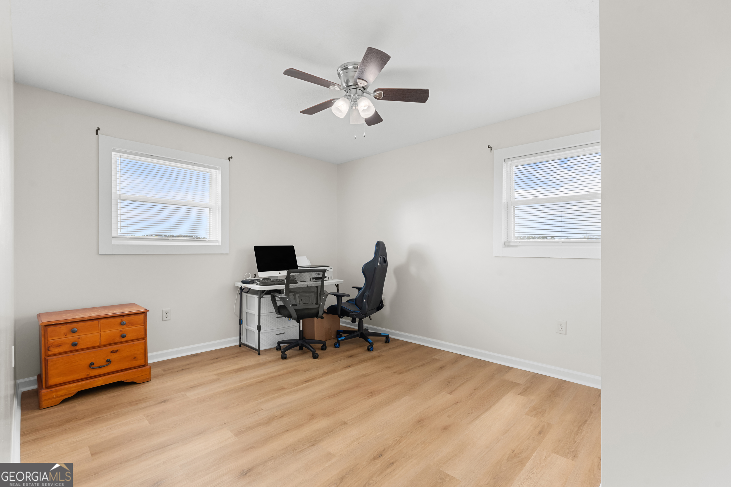 664 Boyd School Road Sylvania, GA 30467 - Photo 16 of 33 a workspace with furniture and a window