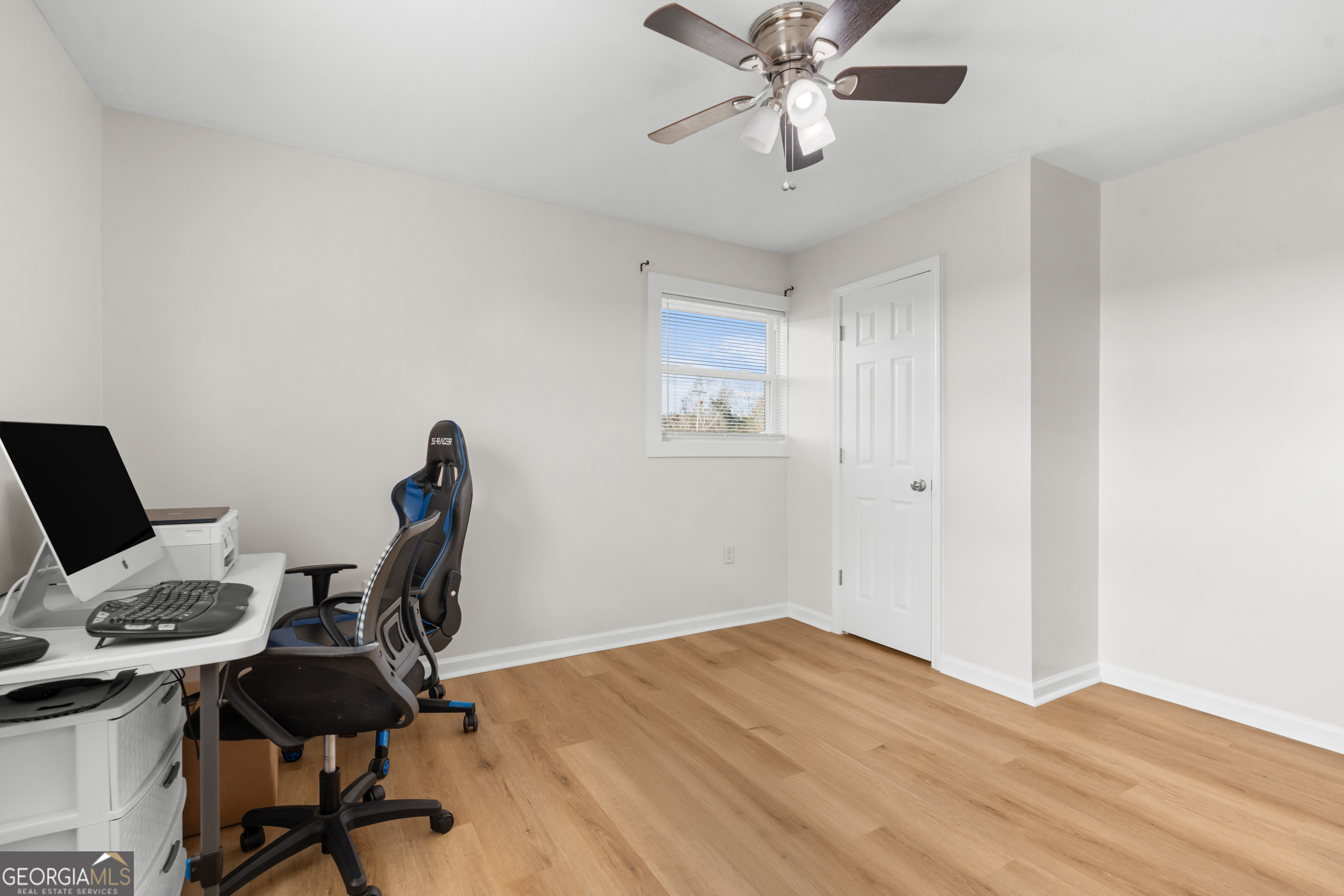 664 Boyd School Road Sylvania, GA 30467 - Photo 17 of 33 a view of a workspace with furniture and a window