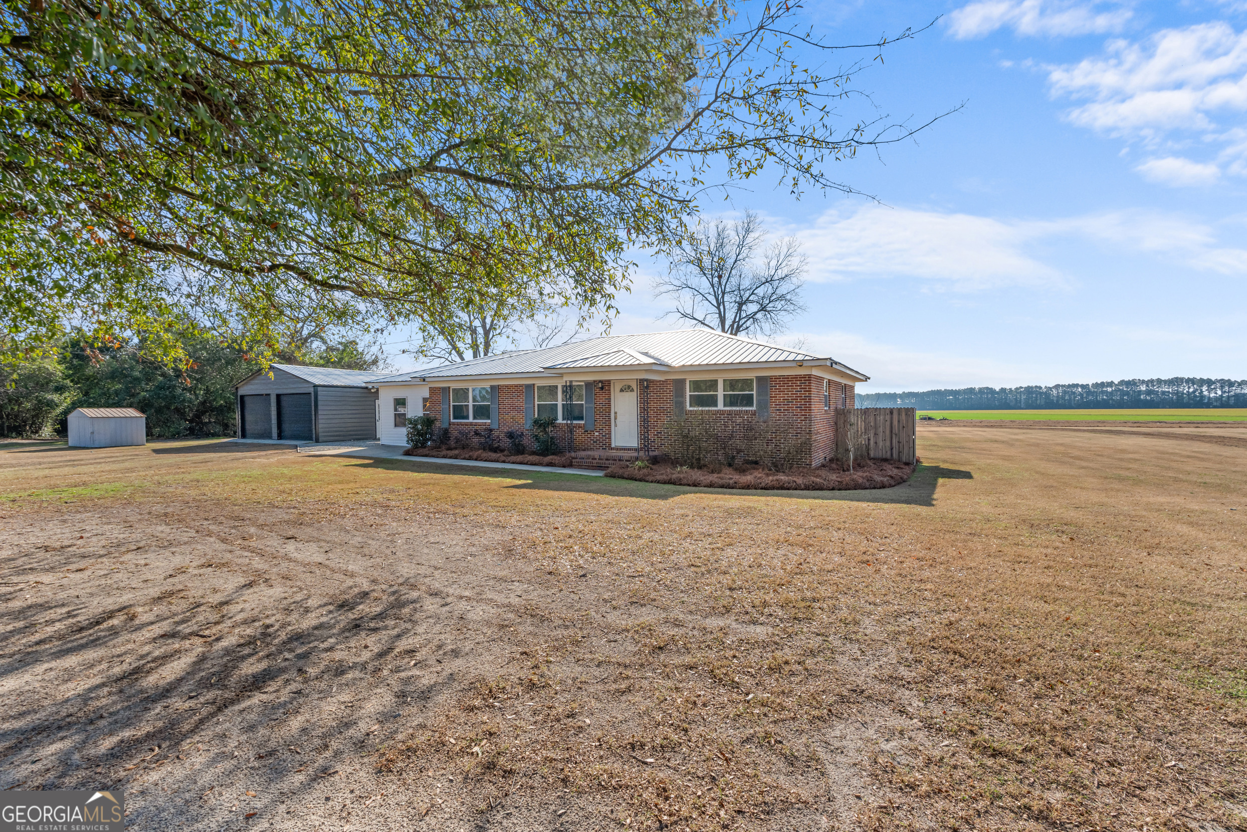 664 Boyd School Road Sylvania, GA 30467 - Photo 2 of 33 a front view of a house with a yard