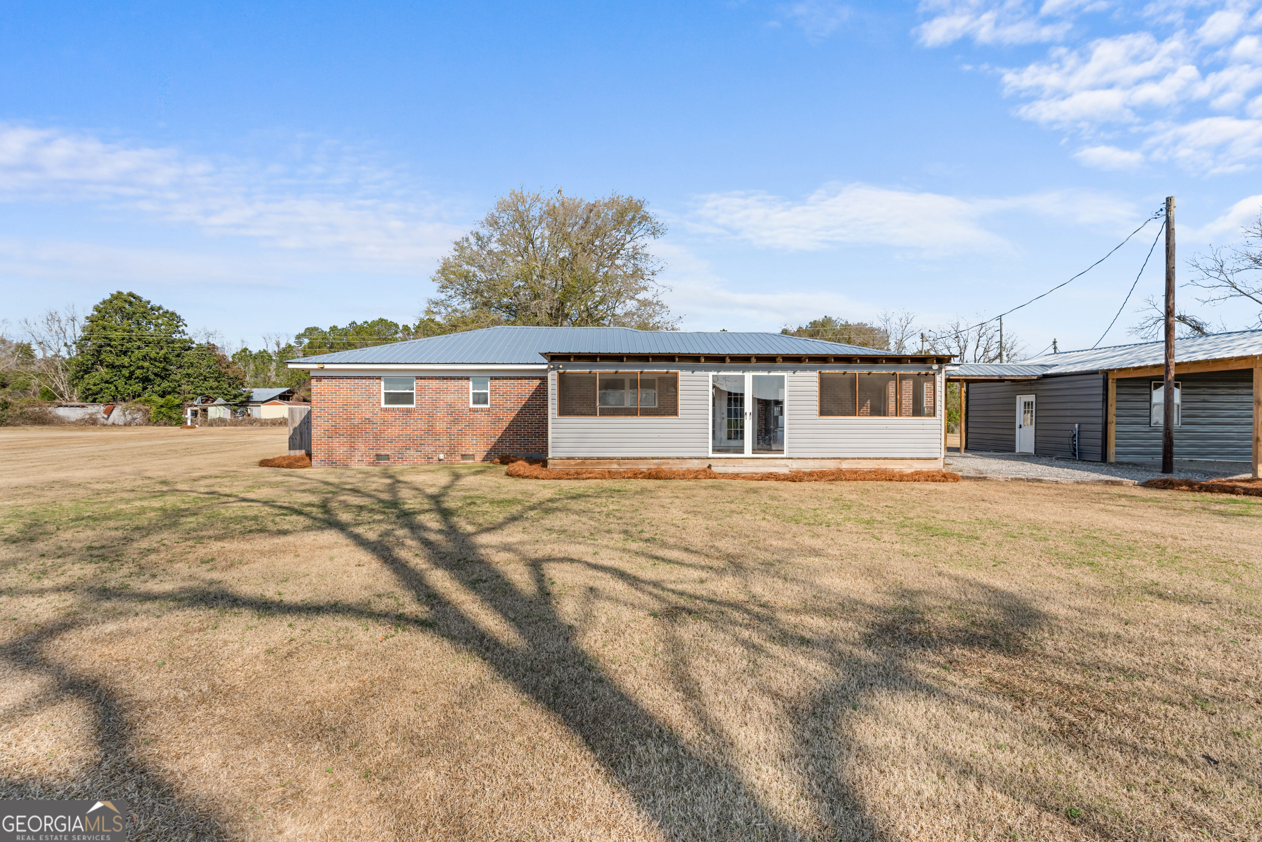664 Boyd School Road Sylvania, GA 30467 - Photo 24 of 33 a front view of a house with a yard
