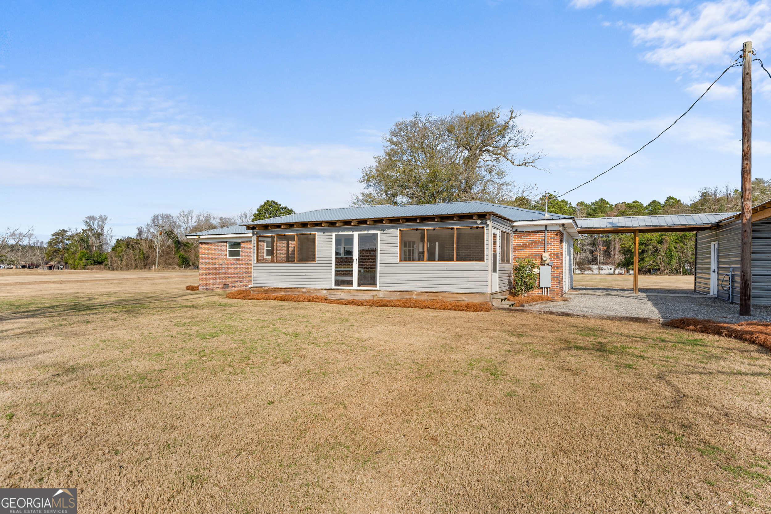 664 Boyd School Road Sylvania, GA 30467 - Photo 25 of 33 front view of a house with a patio