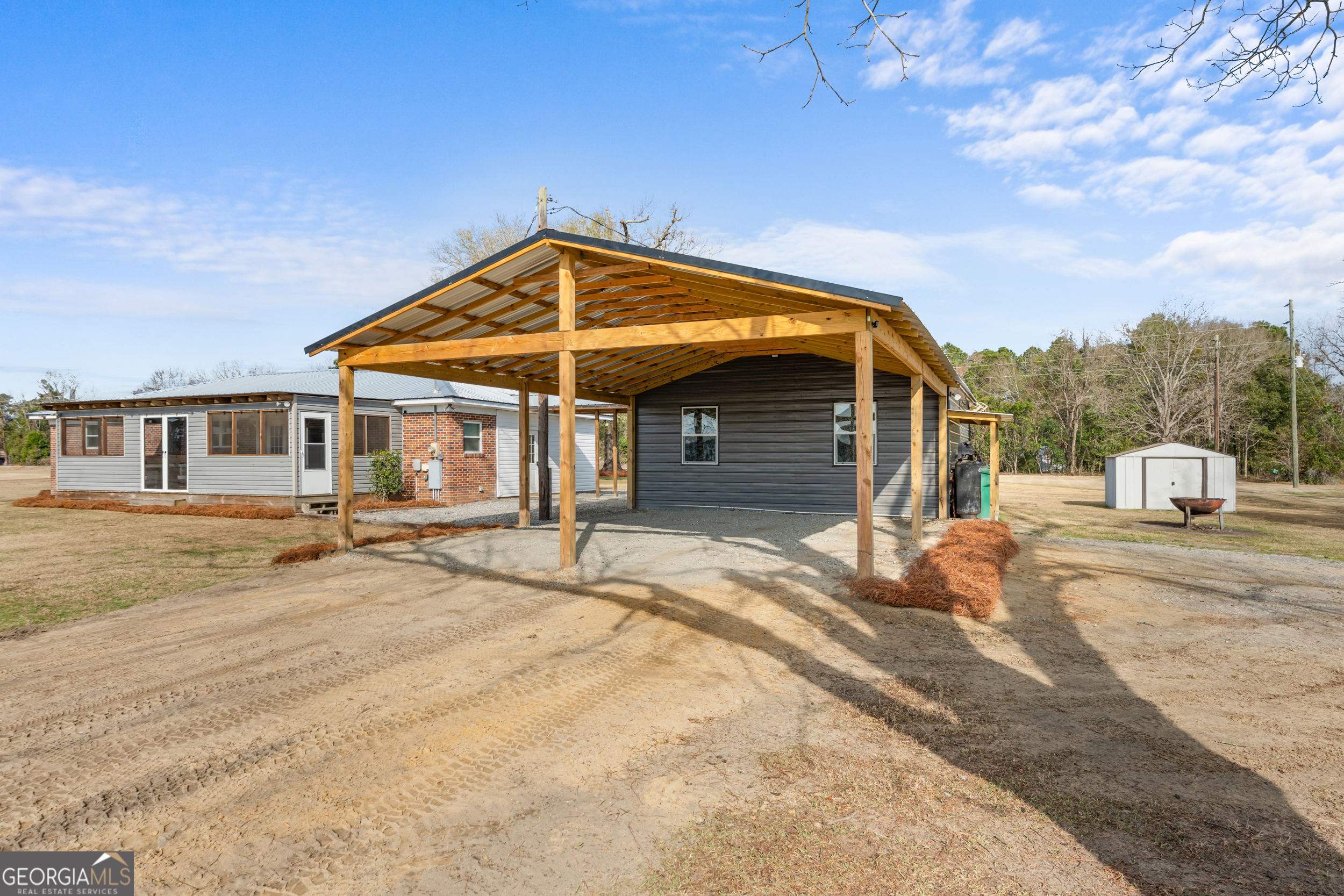 664 Boyd School Road Sylvania, GA 30467 - Photo 26 of 33 a view of a house with a outdoor space