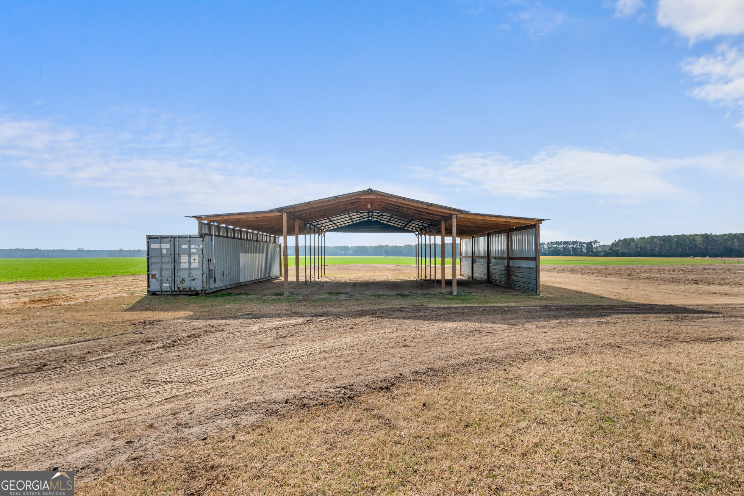 664 Boyd School Road Sylvania, GA 30467 - Photo 27 of 33 a front view of a house with a ocean beach