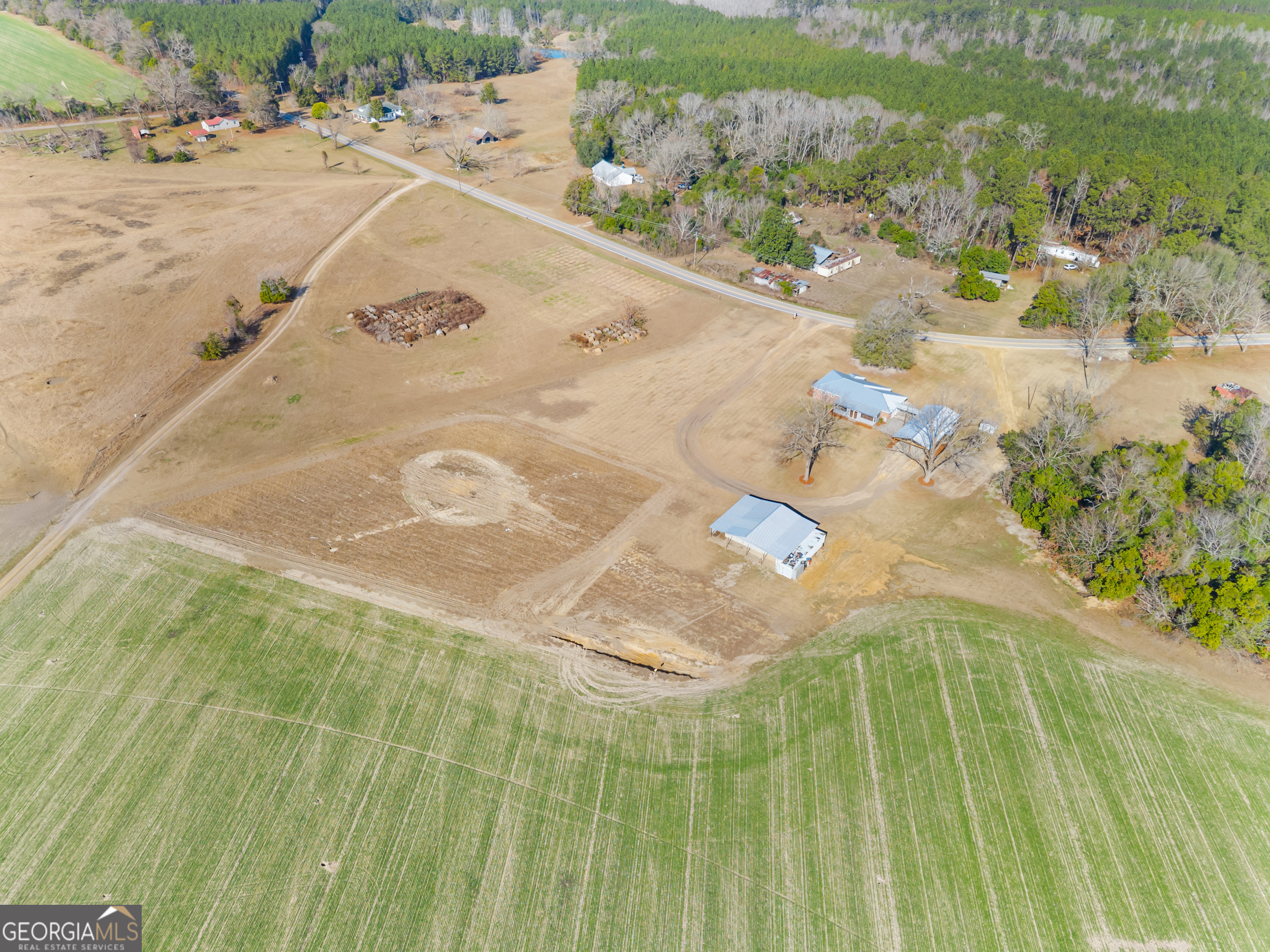 664 Boyd School Road Sylvania, GA 30467 - Photo 30 of 33 a view of a swimming pool with a yard