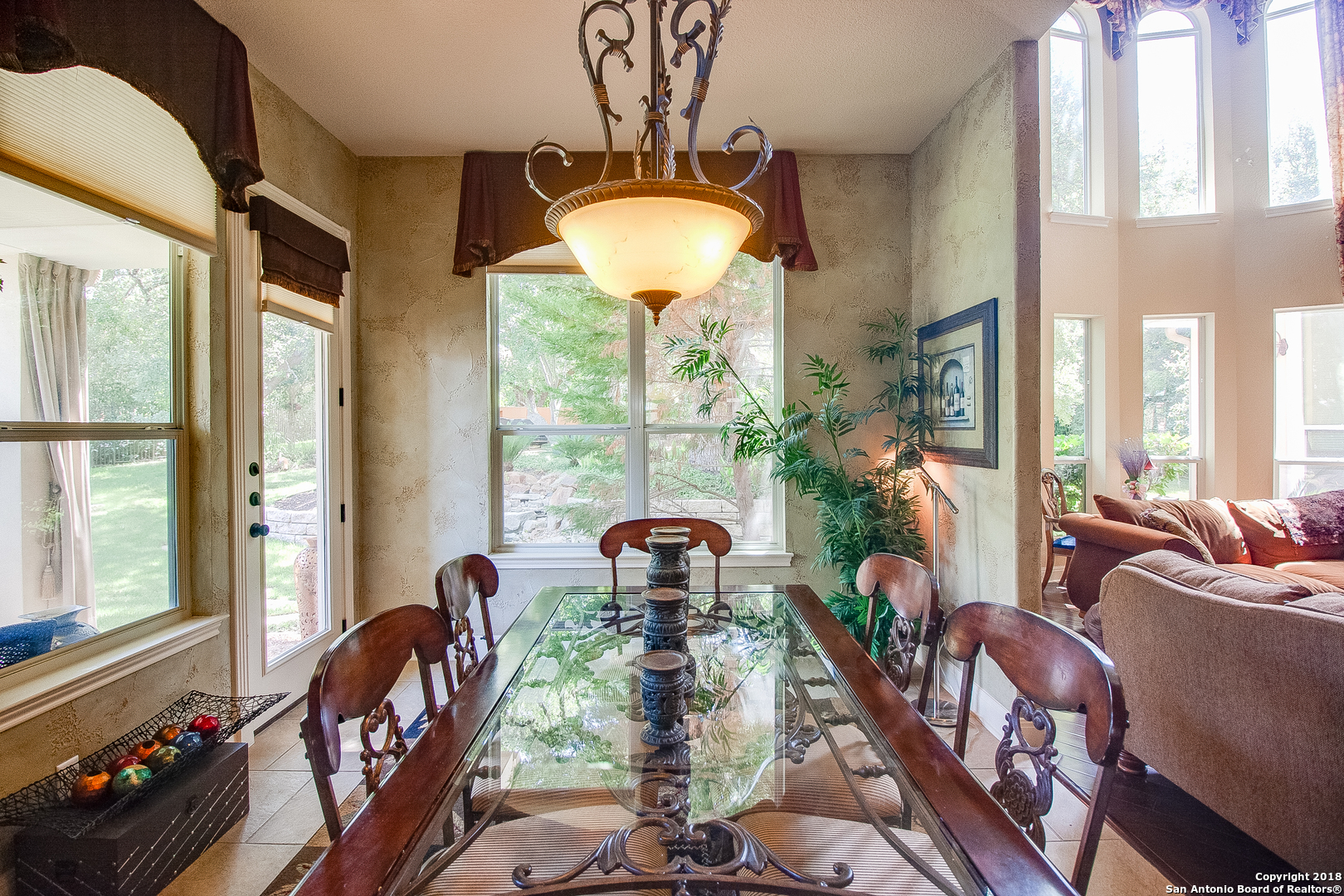 7327 Hovingham San Antonio, TX 78257 - Photo 11 of 26 a view of a dining room with furniture and chandelier