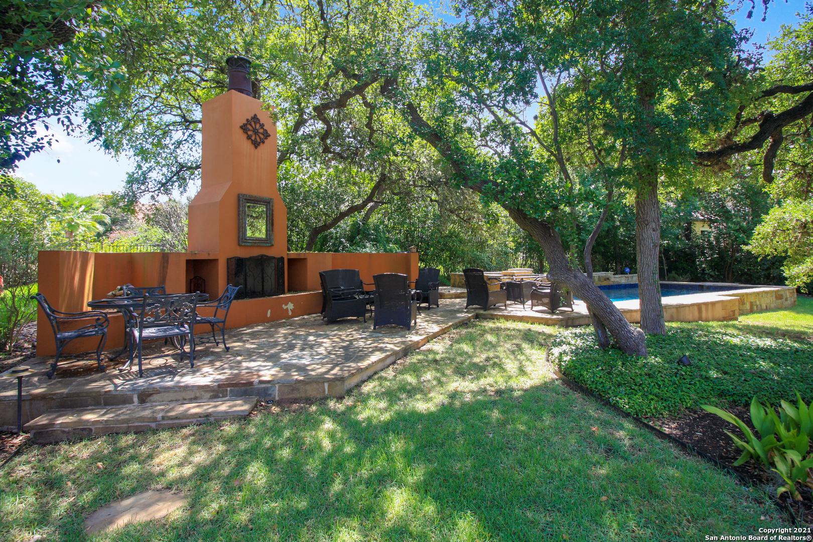 7327 Hovingham San Antonio, TX 78257 - Photo 17 of 26 a front view of a house with garden and sitting area