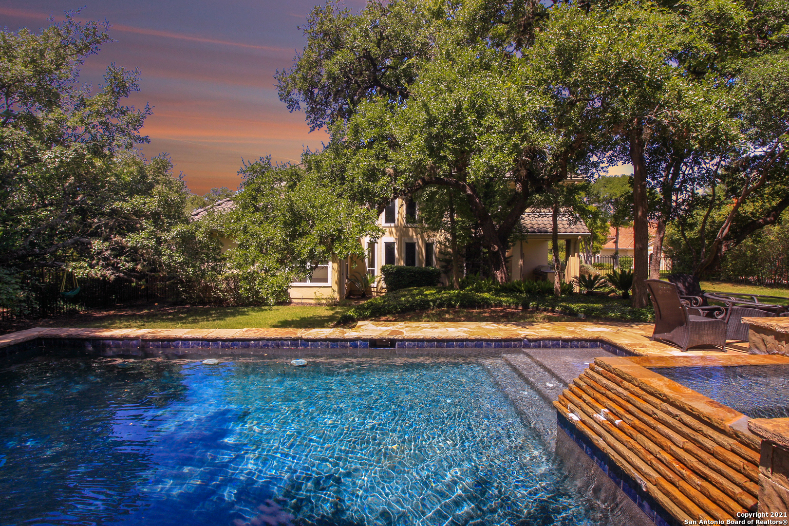 7327 Hovingham San Antonio, TX 78257 - Photo 21 of 26 a view of a swimming pool with an outdoor space and seating area
