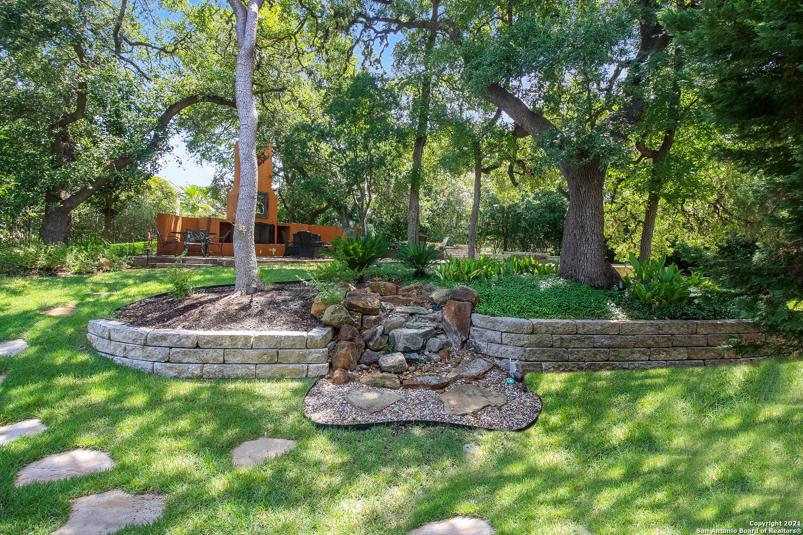 7327 Hovingham San Antonio, TX 78257 - Photo 24 of 26 a view of a garden with a fountain